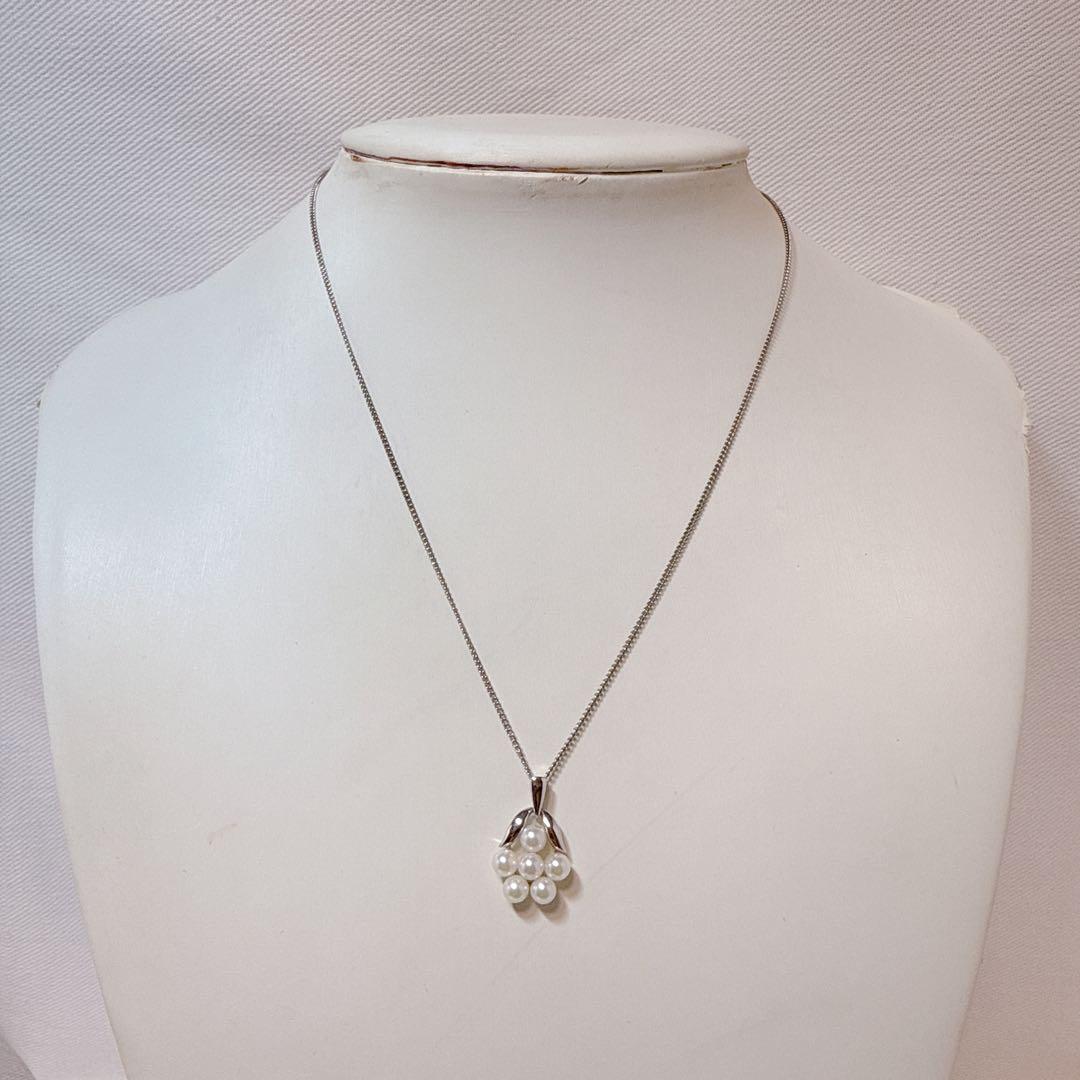 Mikimoto silver necklace featuring six Akoya baby pearls on a 40cm chain