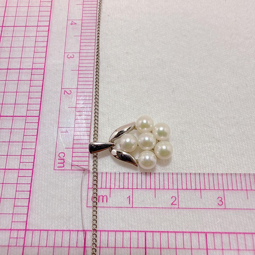Mikimoto silver necklace featuring six Akoya baby pearls on a 40cm chain