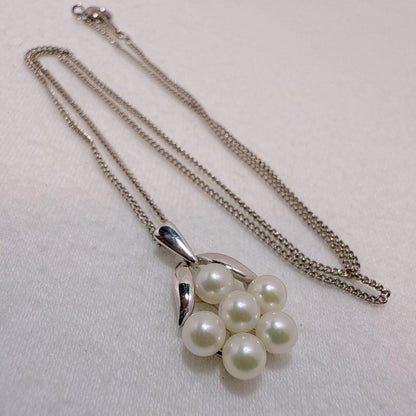 Mikimoto silver necklace featuring six Akoya baby pearls on a 40cm chain