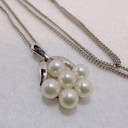 Mikimoto silver necklace featuring six Akoya baby pearls on a 40cm chain