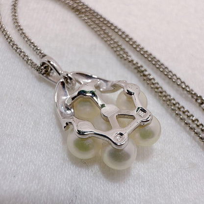 Mikimoto silver necklace featuring six Akoya baby pearls on a 40cm chain