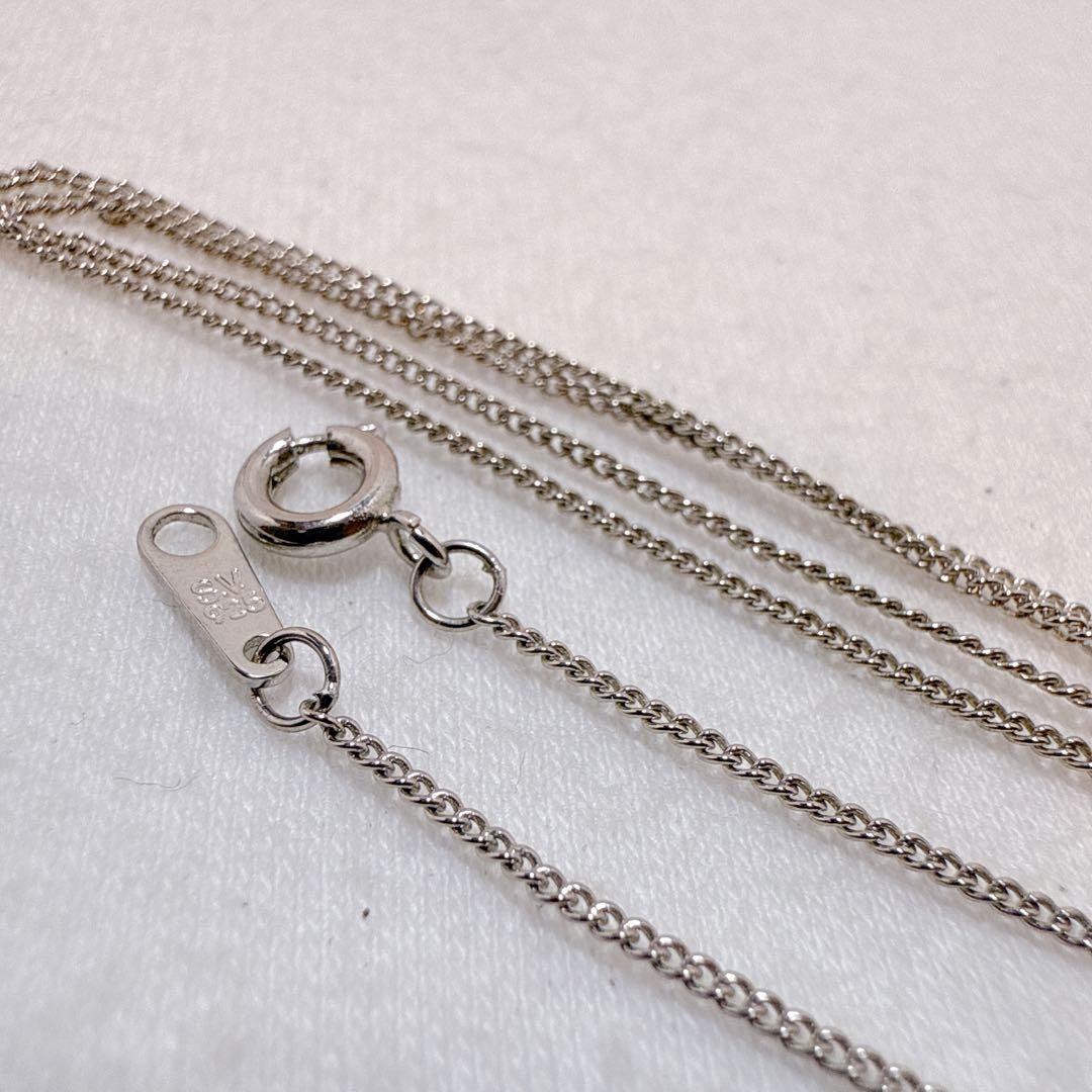 Mikimoto silver necklace featuring six Akoya baby pearls on a 40cm chain