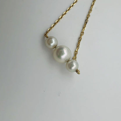 MIKIMOTO K18 necklace with 4.3 to 6.1 mm pearls, 38 cm length, displayed on white background