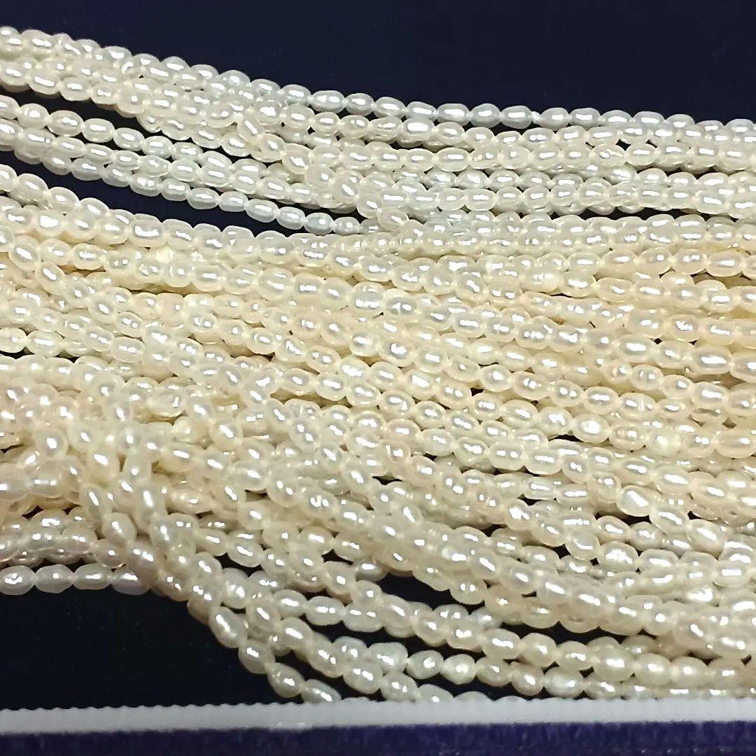 Akoya Keshijima 10-strand pearl long necklace about 81 cm with silver clasp and knotted connection