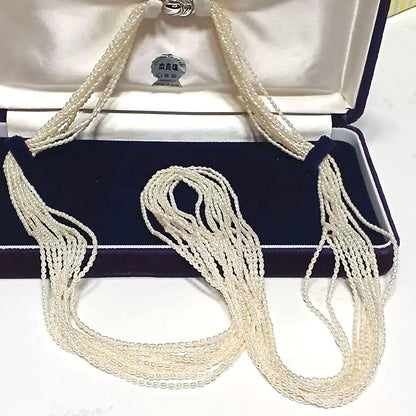 Akoya Keshijima 10-strand pearl long necklace about 81 cm with silver clasp and knotted connection