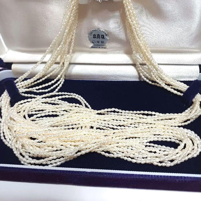 Akoya Keshijima 10-strand pearl long necklace about 81 cm with silver clasp and knotted connection