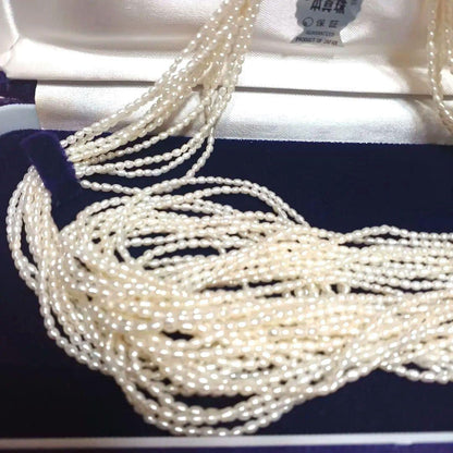 Akoya Keshijima 10-strand pearl long necklace about 81 cm with silver clasp and knotted connection