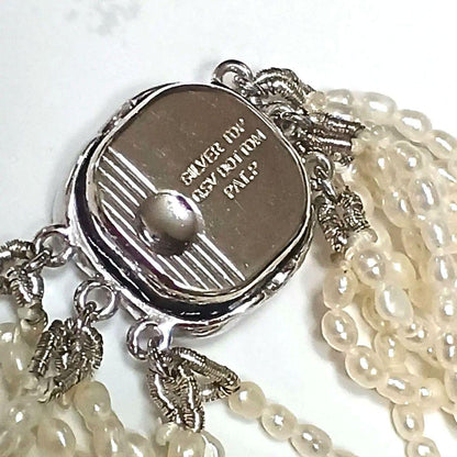Akoya Keshijima 10-strand pearl long necklace about 81 cm with silver clasp and knotted connection