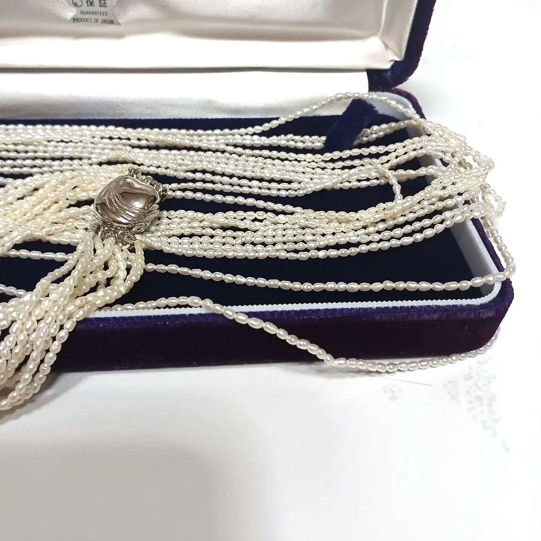 Akoya Keshijima 10-strand pearl long necklace about 81 cm with silver clasp and knotted connection
