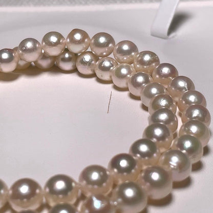 Akoya pearl necklace with 6.4-6.8mm round white pearls on silver chain 44cm length