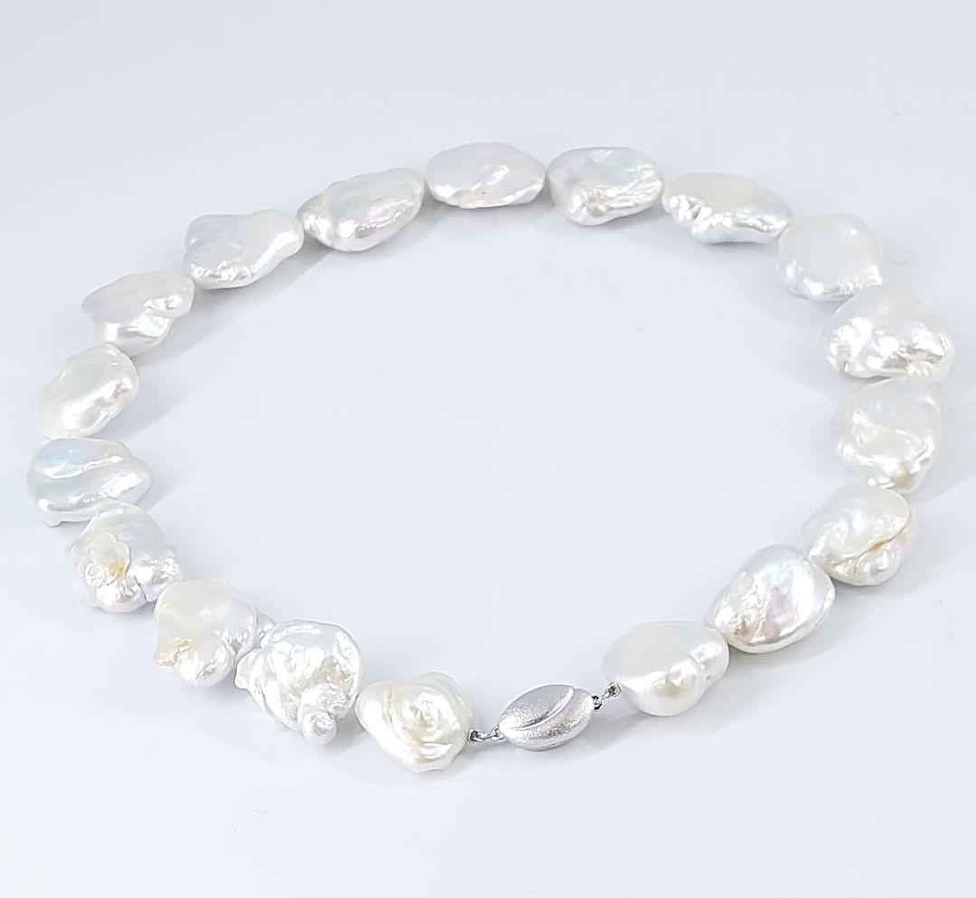 Baroque pearl necklace about 43cm long with natural white untinted pearls sized 18-27mm