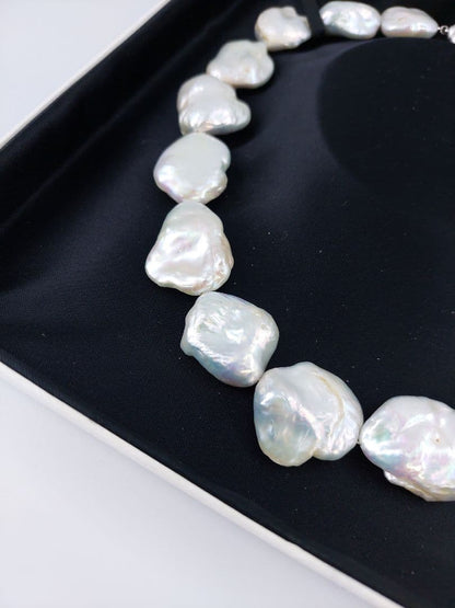 Baroque pearl necklace about 43cm long with natural white untinted pearls sized 18-27mm