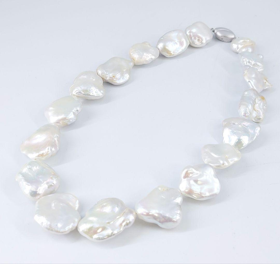 Baroque pearl necklace about 43cm long with natural white untinted pearls sized 18-27mm