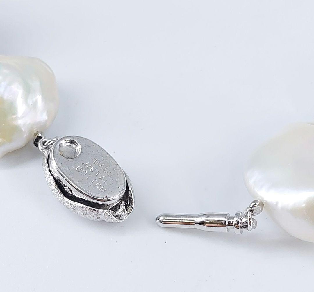 Baroque pearl necklace about 43cm long with natural white untinted pearls sized 18-27mm