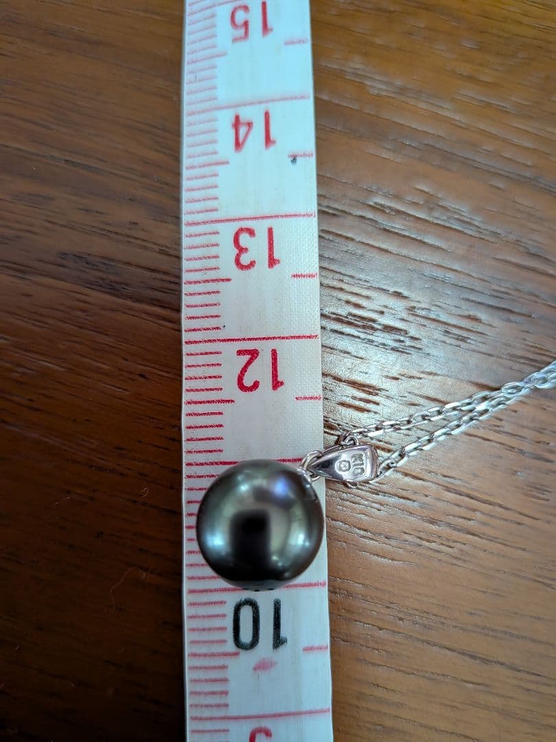 MIKIMOTO necklace with a 10mm black pearl set in 18K white gold