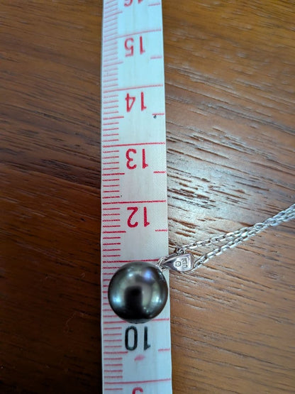 MIKIMOTO necklace with a 10mm black pearl set in 18K white gold