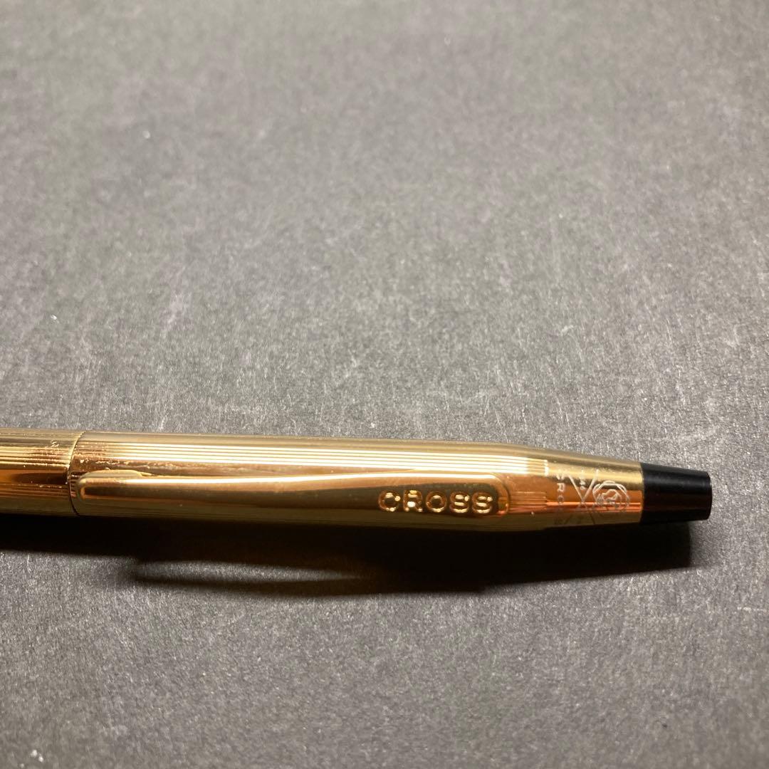 Cross Classic Century gold ballpoint pen in used condition with sleek design