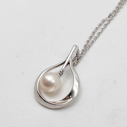 Mikimoto necklace with a single white genuine pearl on a silver chain