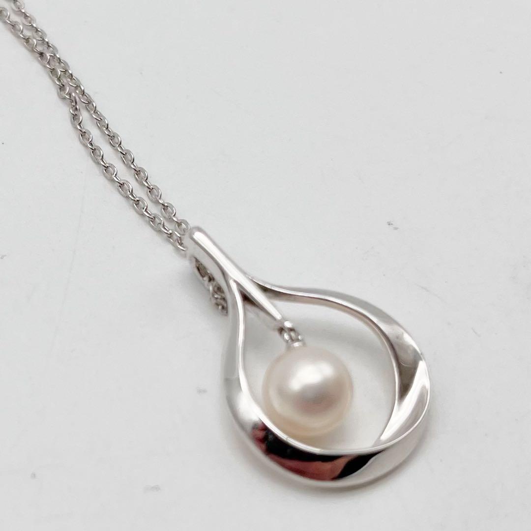 Mikimoto necklace with a single white genuine pearl on a silver chain