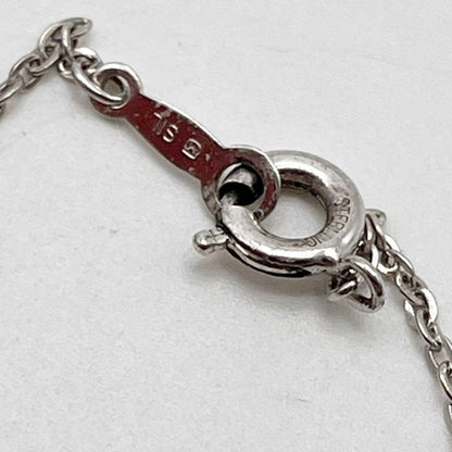 Mikimoto necklace with a single white genuine pearl on a silver chain