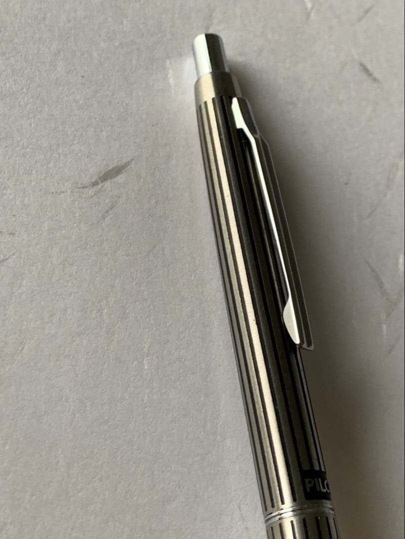 PILOT ballpoint pen with silver stripe engraving, showing front and side views