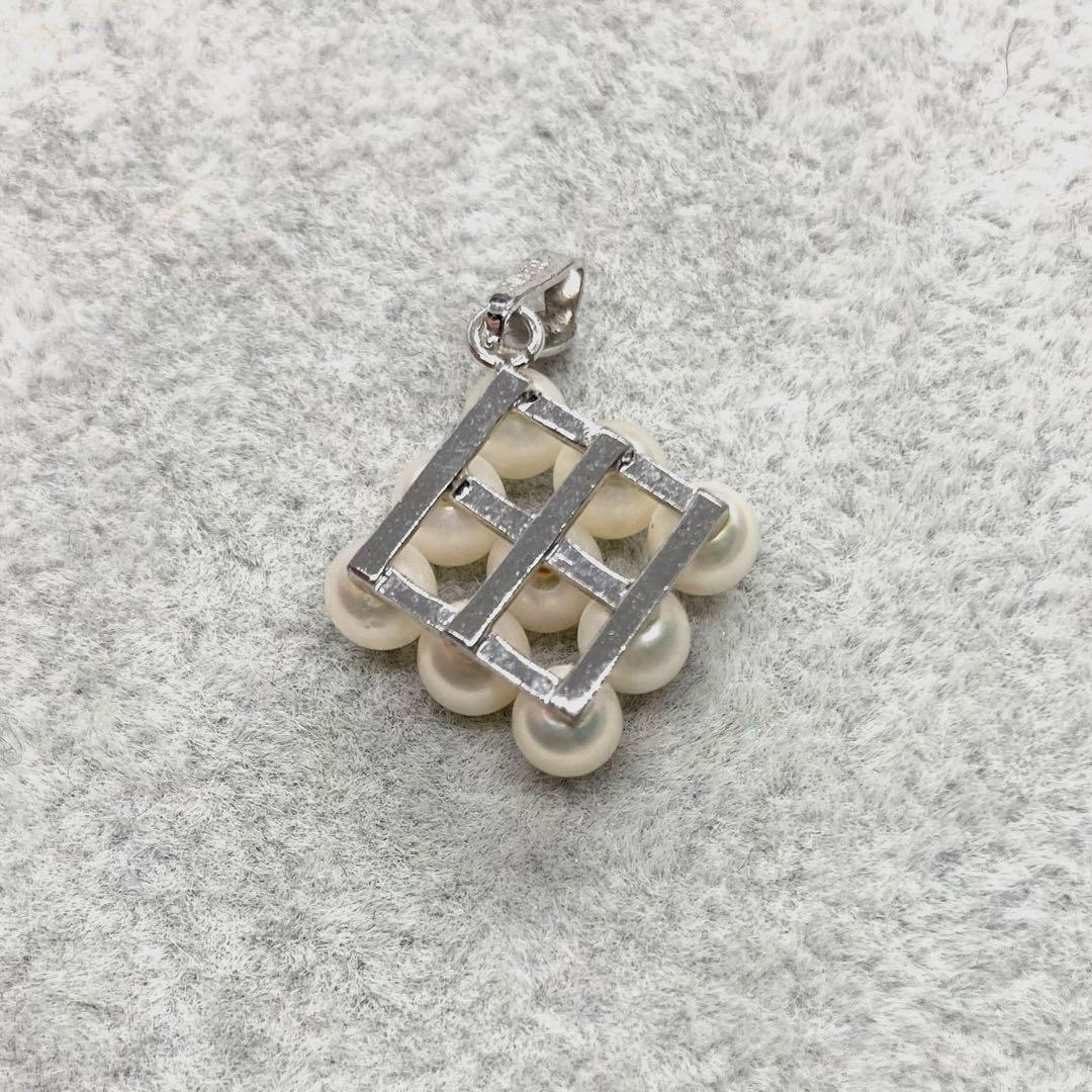 Akoya pearl pendant top with 9 white pearls 4.3mm silver marking size 1.6cm by 1.6cm