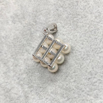 Akoya pearl pendant top with 9 white pearls 4.3mm silver marking size 1.6cm by 1.6cm