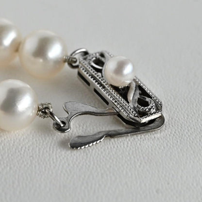 Highest grade Mikimoto M Charm large round Akoya pearl necklace with 42 cm length and K14 white gold clasp