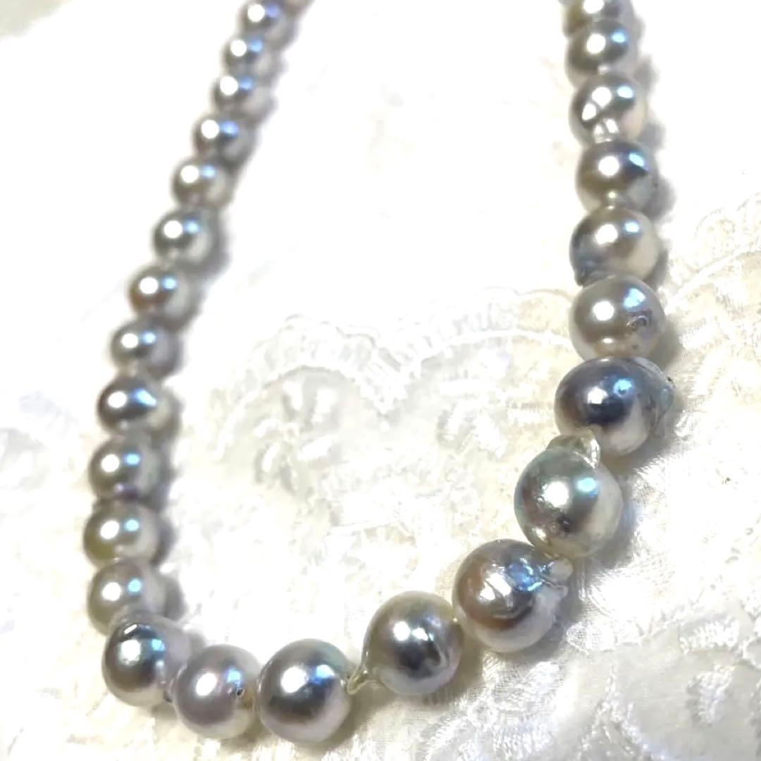 High-quality Akoya baroque pearl in blue-gray color measuring 9.5 to 9 mm with certificate