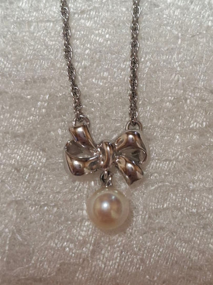 TASAKI Ribbon Motif Pearl Necklace in silver with 37 cm chain, brand new and unused