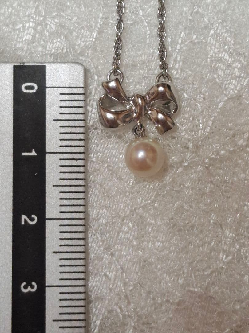 TASAKI Ribbon Motif Pearl Necklace in silver with 37 cm chain, brand new and unused