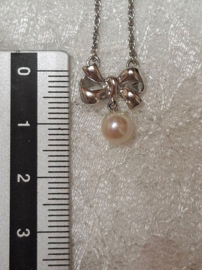 TASAKI Ribbon Motif Pearl Necklace in silver with 37 cm chain, brand new and unused
