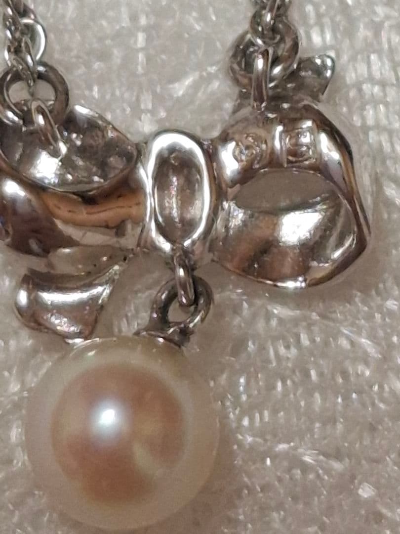 TASAKI Ribbon Motif Pearl Necklace in silver with 37 cm chain, brand new and unused