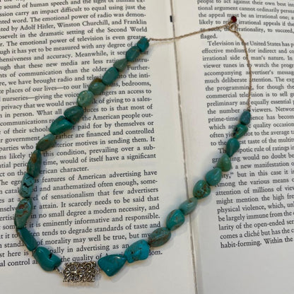 Agete necklace featuring 25 turquoise stones and 1 ruby stone with K10 gold-plated chain and openwork design