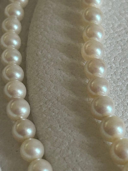 Akoya pearl gradient double necklace with silver clasp featuring white pearls ranging from 3 to 8 mm