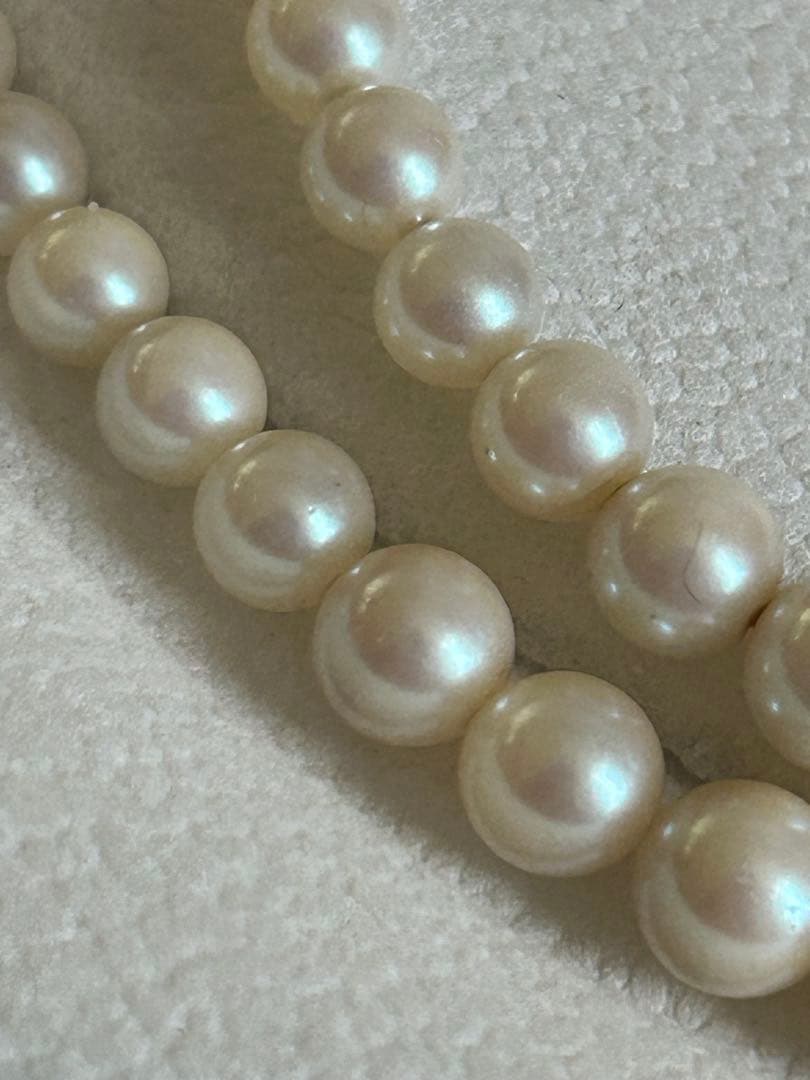 Akoya pearl gradient double necklace with silver clasp featuring white pearls ranging from 3 to 8 mm