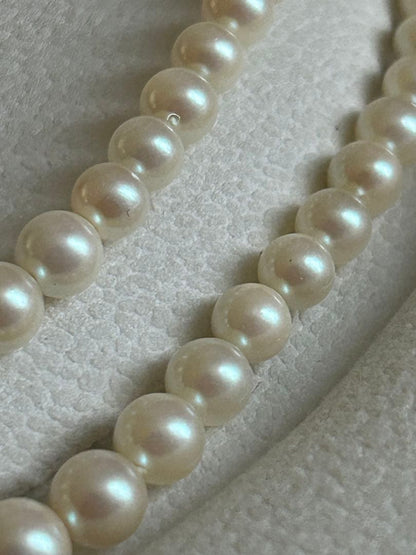 Akoya pearl gradient double necklace with silver clasp featuring white pearls ranging from 3 to 8 mm