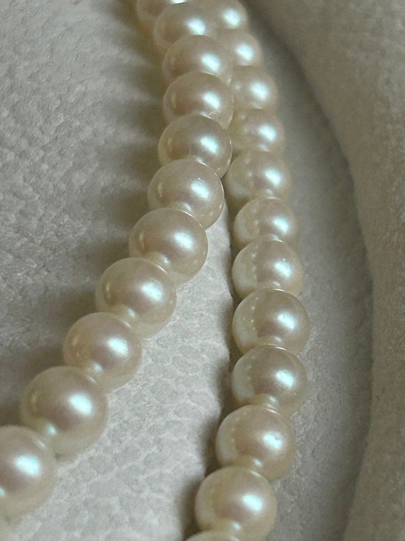 Akoya pearl gradient double necklace with silver clasp featuring white pearls ranging from 3 to 8 mm