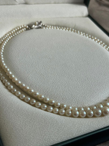 Akoya pearl gradient double necklace with silver clasp featuring white pearls ranging from 3 to 8 mm