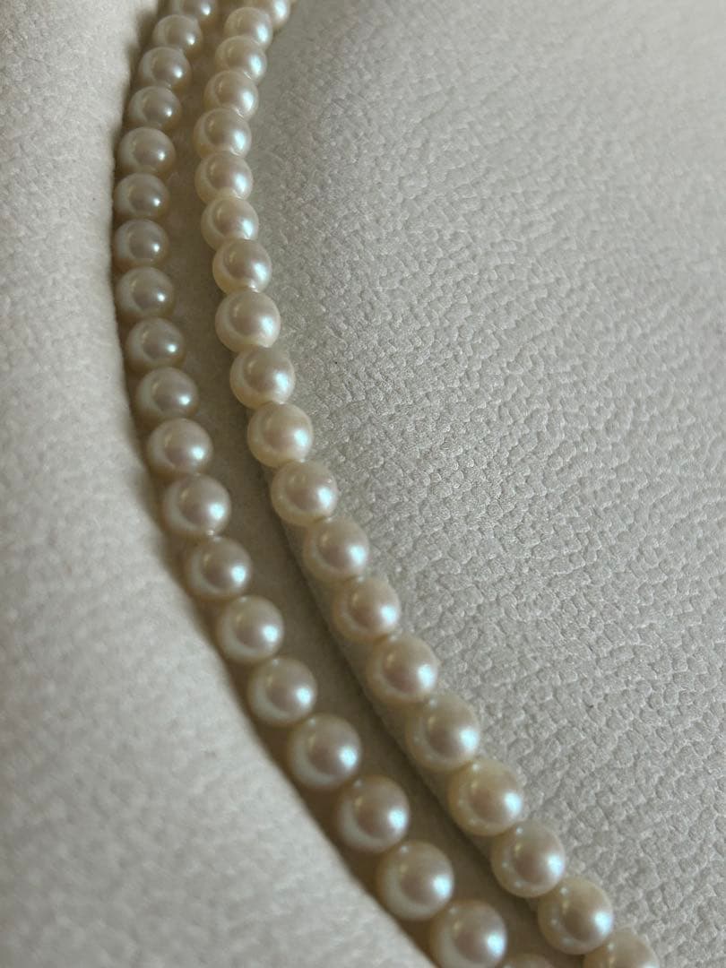 Akoya pearl gradient double necklace with silver clasp featuring white pearls ranging from 3 to 8 mm