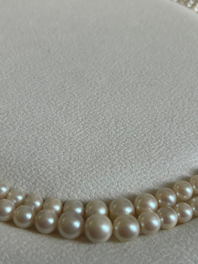 Akoya pearl gradient double necklace with silver clasp featuring white pearls ranging from 3 to 8 mm