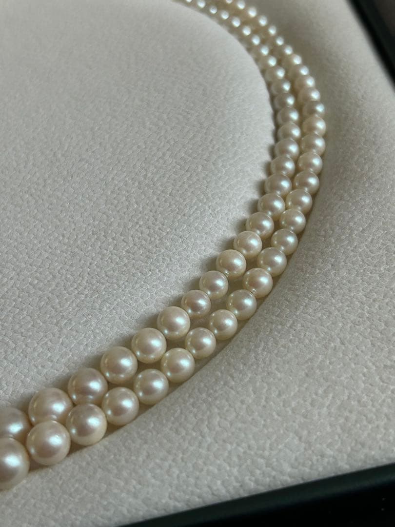 Akoya pearl gradient double necklace with silver clasp featuring white pearls ranging from 3 to 8 mm