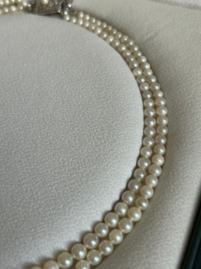 Akoya pearl gradient double necklace with silver clasp featuring white pearls ranging from 3 to 8 mm