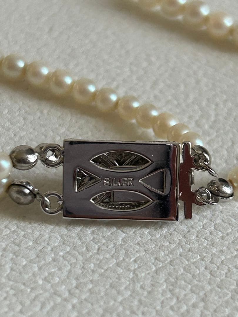 Akoya pearl gradient double necklace with silver clasp featuring white pearls ranging from 3 to 8 mm