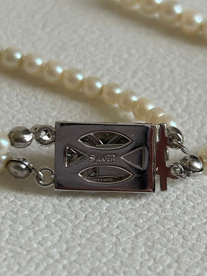 Akoya pearl gradient double necklace with silver clasp featuring white pearls ranging from 3 to 8 mm