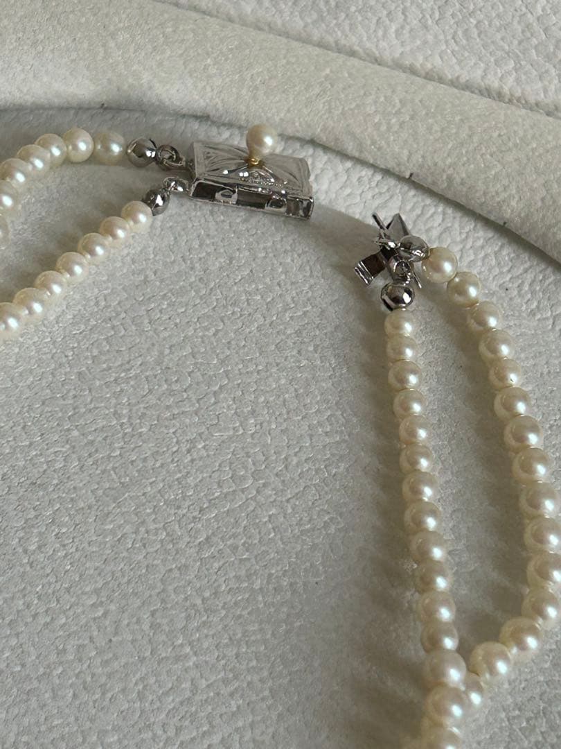 Akoya pearl gradient double necklace with silver clasp featuring white pearls ranging from 3 to 8 mm