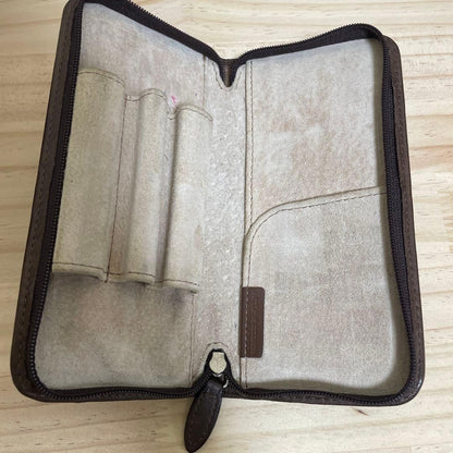 Brown leather Pilot pen case with zipper holding three pens and one pocket