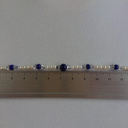 Akoya baby pearl necklace 43 cm with deep blue Lapis Lazuli stones and silver flower-shaped closure