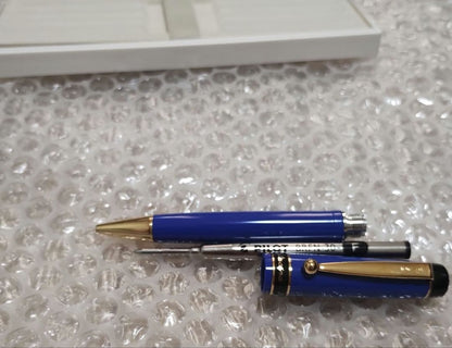 Pilot Lucina ballpoint pen with blue and gold body, new and unused