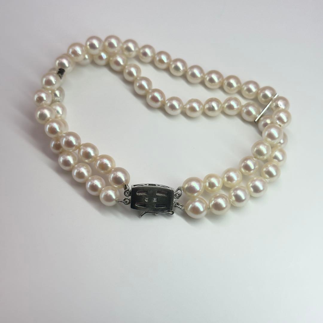 Tasaki silver 2-strand bracelet with approximately 6.0-6.2mm pearls measuring about 19cm